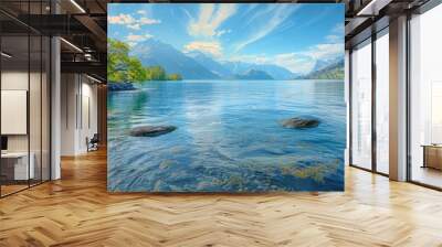 Lake offers a breathtaking vista of serene waters framed by majestic mountain peaks. Wall mural