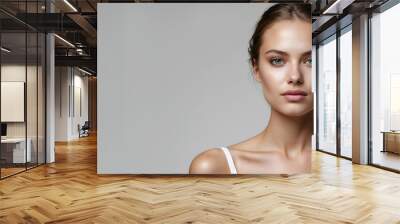 Close up portrait of a beauty fashion model with beautiful natural skin. Perfect face structure, skincare and beauty concept, copy space. Wall mural