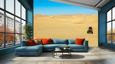 Quad driving people - two happy bikers in sand desert dunes, Africa, Namibia, Namib, Walvis Bay, Swakopmund. Wall mural