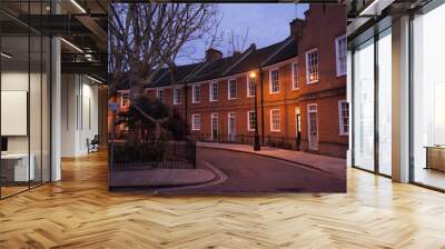 Restored Edwardian brick houses on a local road at night  Wall mural