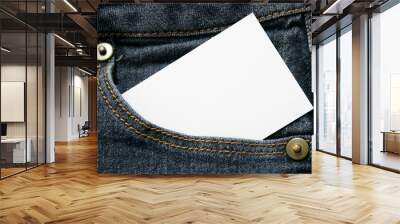 blank white paper or card in front pocket of dark blue jeans with copyspace for sale text or business concept Wall mural