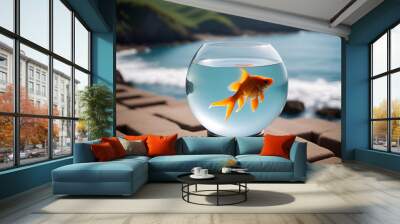 Goldfish in a glass bowl by the sea Wall mural