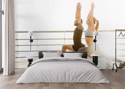 Attractive sporty young fitness couple Wall mural