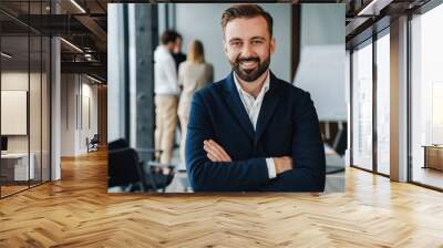 Attractive young confident businessman in formal wear Wall mural