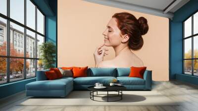 Beauty portrait of an attractive young topless redhead woman Wall mural