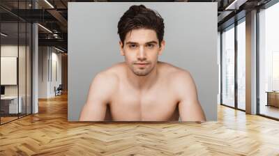 Beauty portrait of half naked concentrated young man Wall mural