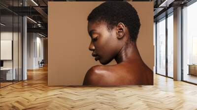 Beauty portrait of young half-naked african woman with short black hair Wall mural