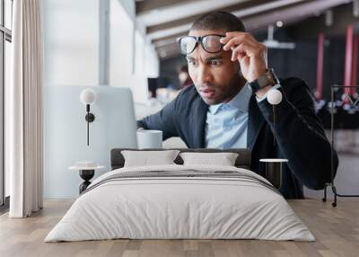 businessman receiving negative news in the office Wall mural