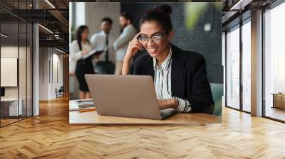 Cheerful young african business woman Wall mural