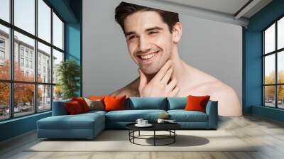 Close up beauty portrait of half naked laughing man Wall mural