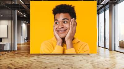 Close up of a cheerful young african teenager boy Wall mural