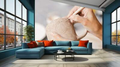 Close up of a woman making ceramic and pottery Wall mural