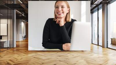 Confident attractive young business woman Wall mural