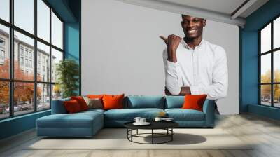 Confident young african business man in white shirt Wall mural