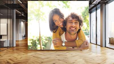 Couple having fun outdoors Wall mural