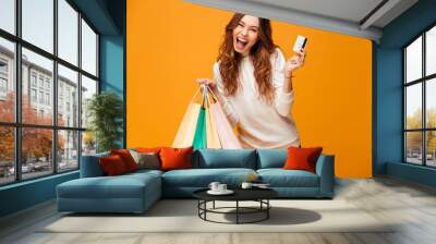 Excited screaming young woman Wall mural