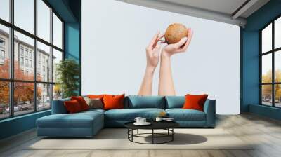 Female hands coconut Wall mural