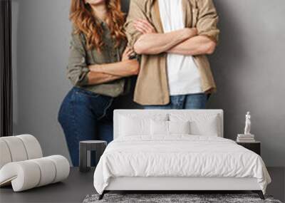 Full length portrait of a cheerful young couple Wall mural