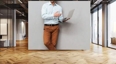 Full length portrait of a happy mature man Wall mural