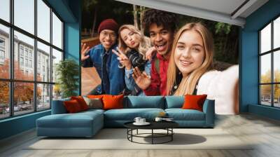 Group if cheerful multiethnic friends teenagers Wall mural