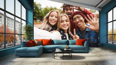 Group if cheerful multiethnic friends teenagers Wall mural