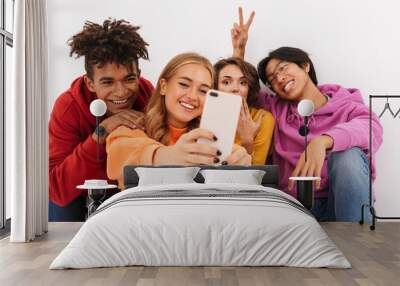 Group of cheerful teenagers isolated Wall mural