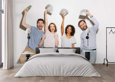 Group of happy multiracial people holding money banknotes Wall mural