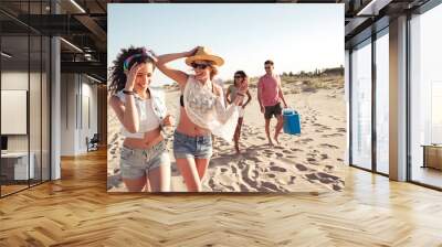 Group of happy young friends in summer clothes Wall mural