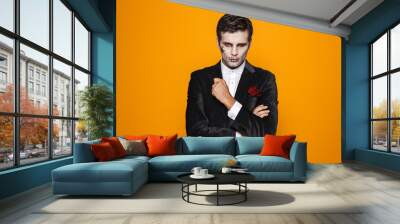 Handsome man zombie looking camera seriously isolated Wall mural