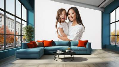 Happy young asian woman mother with her little daughter Wall mural