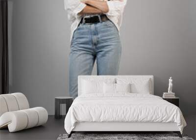 Happy young business woman posing isolated over grey wall background. Wall mural