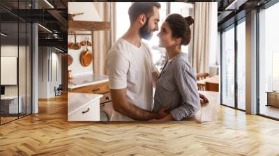 image of adorable brunette couple in love smiling while hugging together in apartment Wall mural