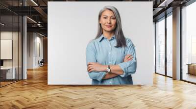 Image of adult mature woman with long white hair looking at camera Wall mural