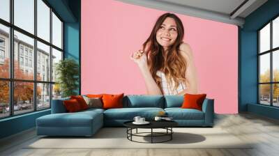 Image of happy beautiful woman smiling and looking upward Wall mural