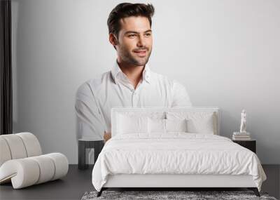 Image of young happy businessman posing and smiling Wall mural