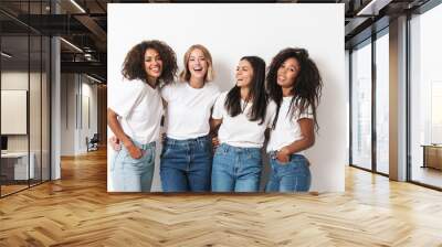 Optimistic cheery young women multiracial friends Wall mural