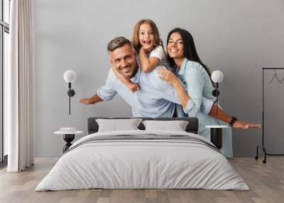 Portrait of a cheerful family Wall mural