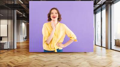 Portrait of a cheerful young woman Wall mural