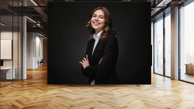 Portrait of a confident young businesswoman Wall mural