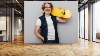 Portrait of a handsome stylish mature man wearing a vest Wall mural