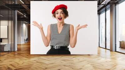 Portrait of a joyful woman dressed in red beret Wall mural