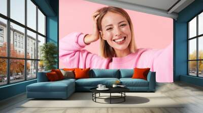 Portrait of a lovely young blonde short haired woman Wall mural