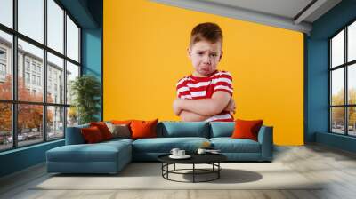 Portrait of a sad upset little boy crying Wall mural