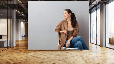 portrait of a smiling casual asian woman Wall mural