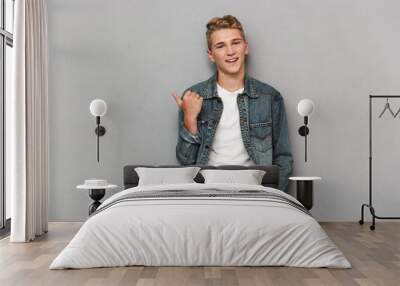 portrait of a smiling casual teenage boy Wall mural