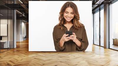 Portrait of a smiling young woman Wall mural