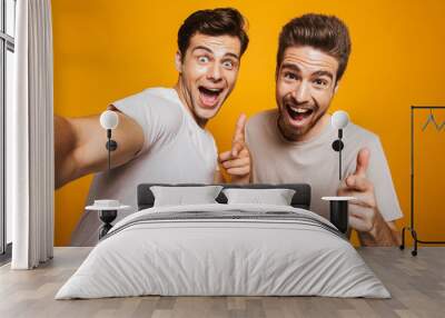 Portrait of a two happy young men best friends Wall mural