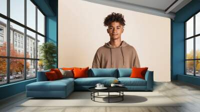 Portrait of a young afro american man dressed in hoodie Wall mural