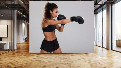 Portrait of an afro american young sportswoman Wall mural