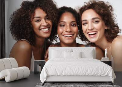 Portrait of young multiracial women standing together and smiling Wall mural